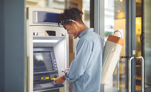 A man using an ATM